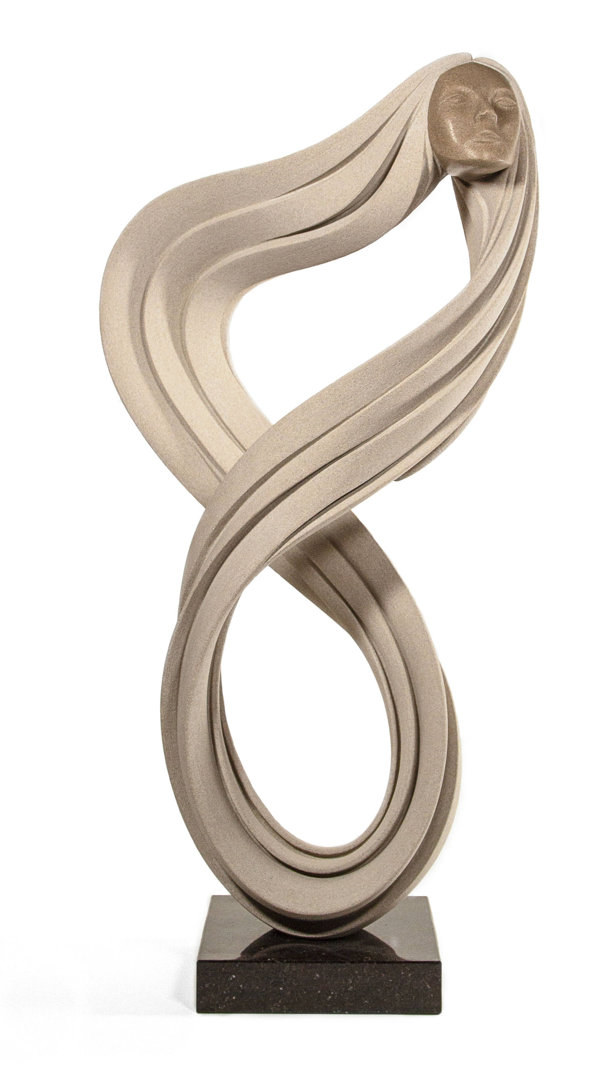 Curved limestone sculpture that includes the face of a woman.